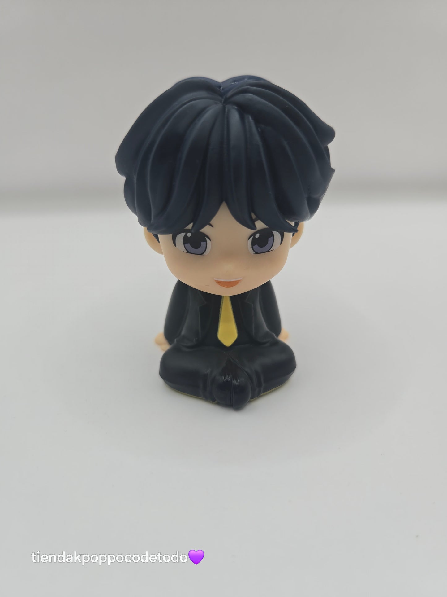 Figuras de integrantes de BTS